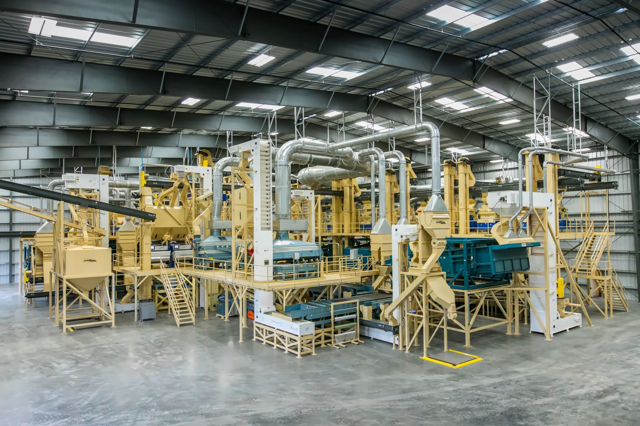 Processing plant with steel platforms inside a large warehouse